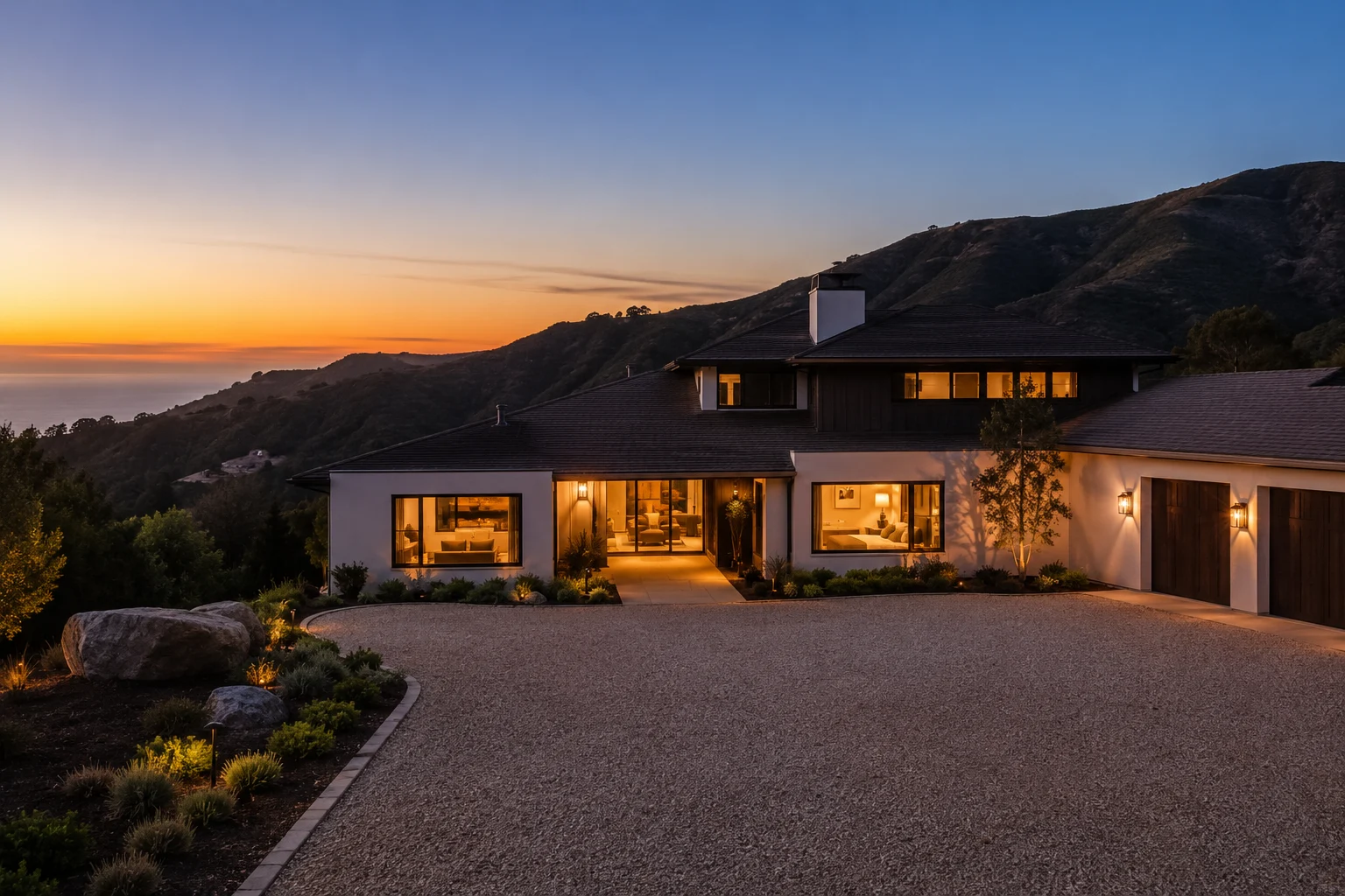 Central Coast home glowing at dusk